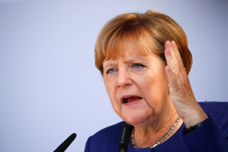 © Reuters. German Chancellor Angela Merkel, a top candidate of the Christian Democratic Union Party (CDU) for the upcoming general elections, speaks during an election rally in Binz