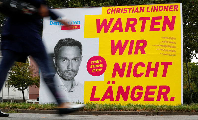 © Reuters. An election campaign poster for the upcoming general elections of FDP party with top candidate Christian Lindner is pictured in Berlin