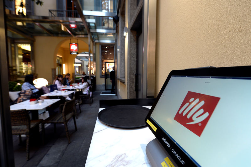 © Reuters. Italian coffee Illy Caffe's logo is seen inside the flagship store in Milan