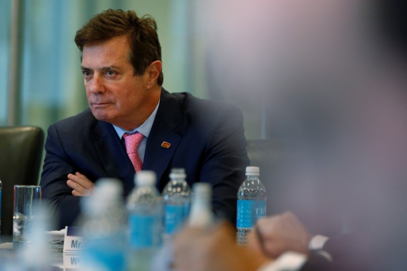 © Reuters. Manafort of Republican presidential nominee Trump's staff listens during a round table discussion on security at Trump Tower in the Manhattan borough of New York