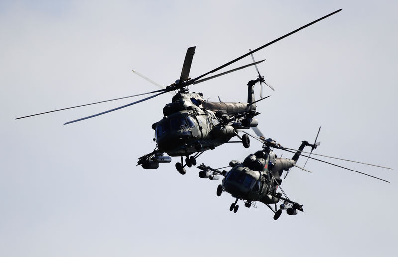 © Reuters. Белорусские военные вертолеты на учениях "Запад-2017"