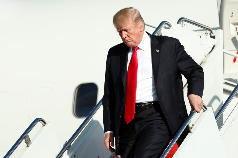 © Reuters. President Trump arrives at Morristown municipal airport