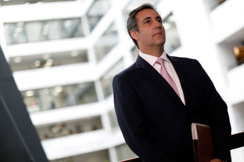 © Reuters. Michael Cohen, President Trump's personal attorney, looks on as his attorney delivers a statement to reporters after meeting with Senate Intelligence Committee staff on Capitol Hill in Washington