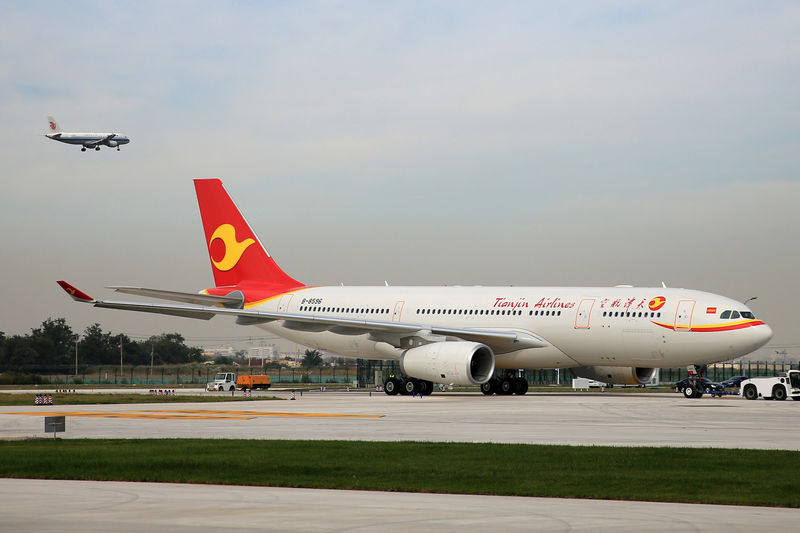 © Reuters. The first Airbus A330 plane to be delivered from Airbus' Chinese completion plant for A330 jets to Tianjin Airlines, is seen during the inauguration ceremony of the plant, in Tianjin