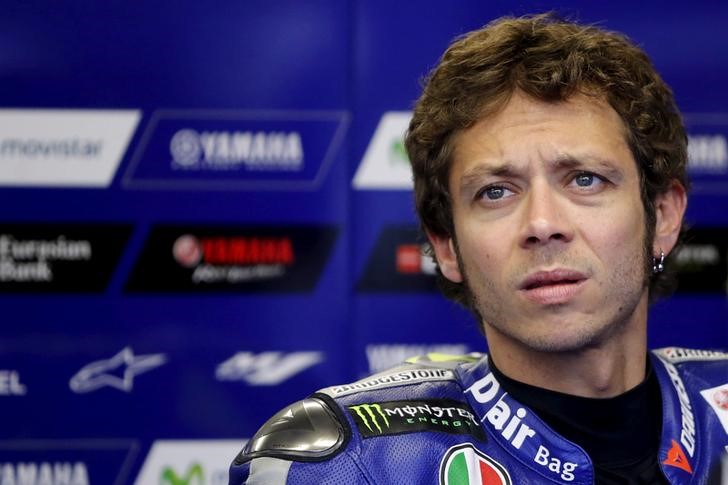 © Reuters. FILE PHOTO - Yamaha MotoGP rider Rossi of Italy is pictured in his team garage during the second free practice session of the French Grand Prix at the Le Mans circuit, in Le Mans, France