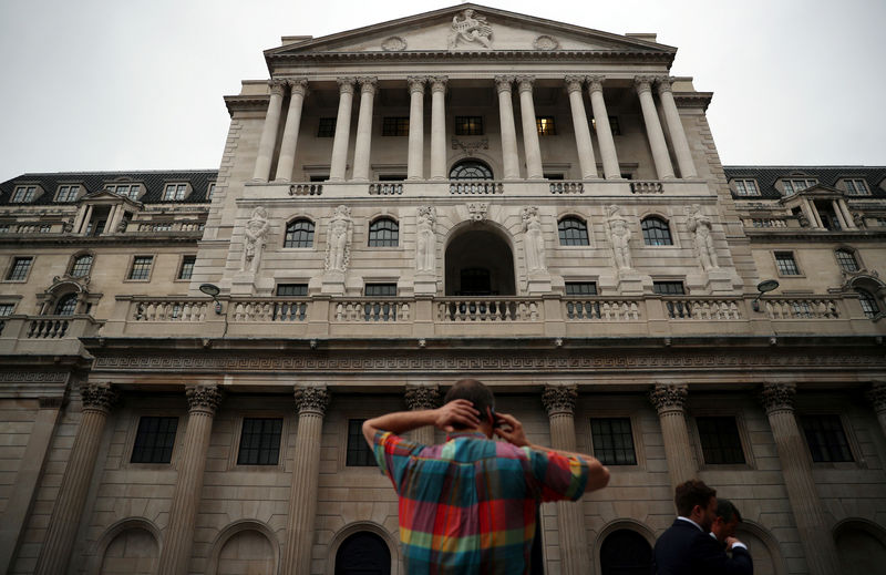 © Reuters. A man speaks on his phone outside the Bank of England in the City of London