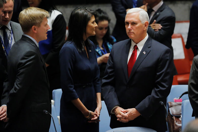 © Reuters. U.S. Vice President Pence stands with U.S. Ambassador to the U.N. Haley before for the start of a meeting of the Security Council to discuss peacekeeping operations in New York