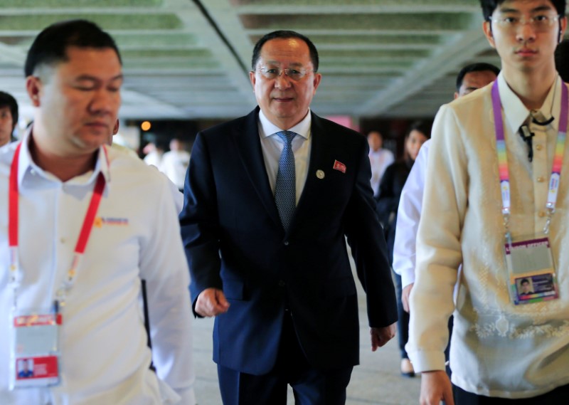 © Reuters. North Korean Foreign Minister Ri Yong-ho walks as he exits after a courtesy call with Philippine President Rodrigo Duterte for the 50th ASEAN Foreign Ministers’ Meeting at the Philippine International Convention Center in Manila