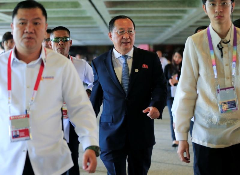 © Reuters. FILE PHOTO: North Korean Foreign Minister Ri Yong-ho walks as he exits after a courtesy call with Philippine President Rodrigo Duterte for the 50th ASEAN Foreign Ministers’ Meeting at the Philippine International Convention Center in Pasay city, met