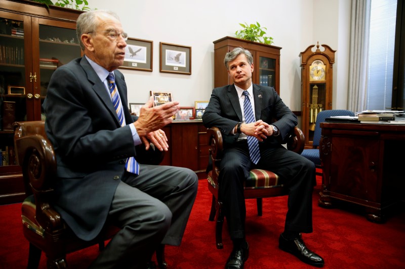 © Reuters. Senate Judiciary Committee Chairman Chuck Grassley (R-IA) meets with FBI Director nominee Christopher Wray in Washington