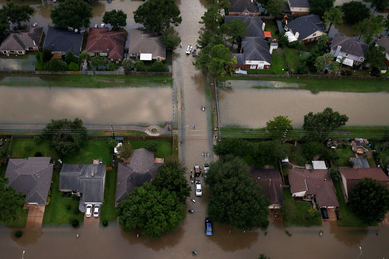 © Reuters. FILE PHOTO: Houses are seen partially submerged in flood waters caused by Tropical Storm Harvey in Northwest Houston Texas