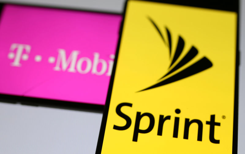 © Reuters. Smartphones with the logos of T-Mobile and Sprint are seen in this illustration