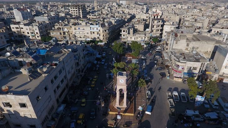 © Reuters. A general view taken with a drone shows the Clock Tower of the rebel-held Idlib city