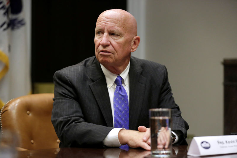 © Reuters. Chairman of the House Ways and Means Committee Kevin Brady (R-TX) listens as U.S. President Donald Trump speaks during a meeting with Republican Congressional leaders about tax reform in Washington