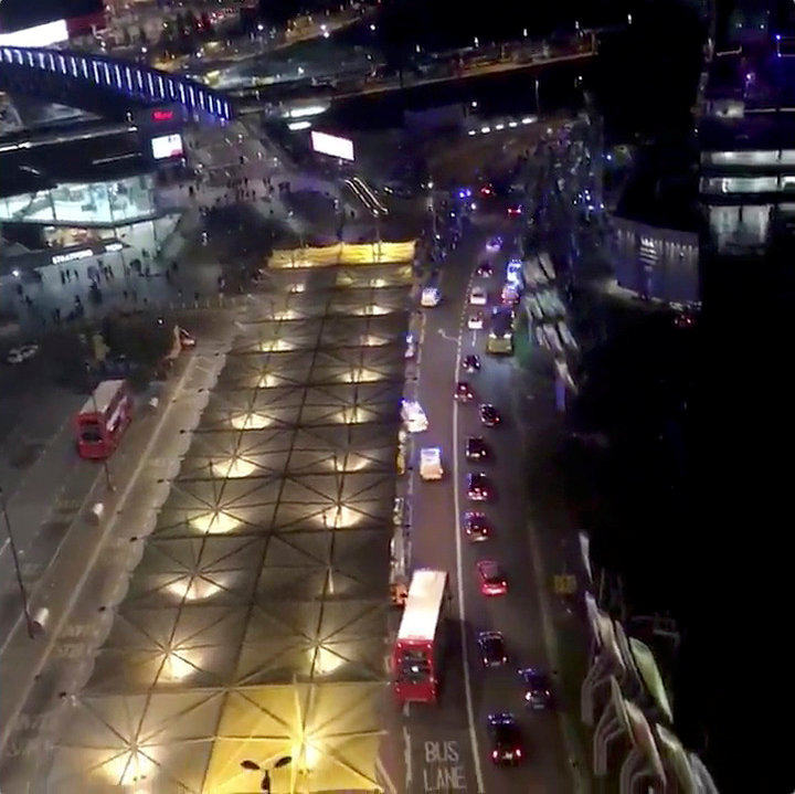 © Reuters. A still image from video shows ambulances and other emergency services response vehicles outside Stratford station in London, Britain