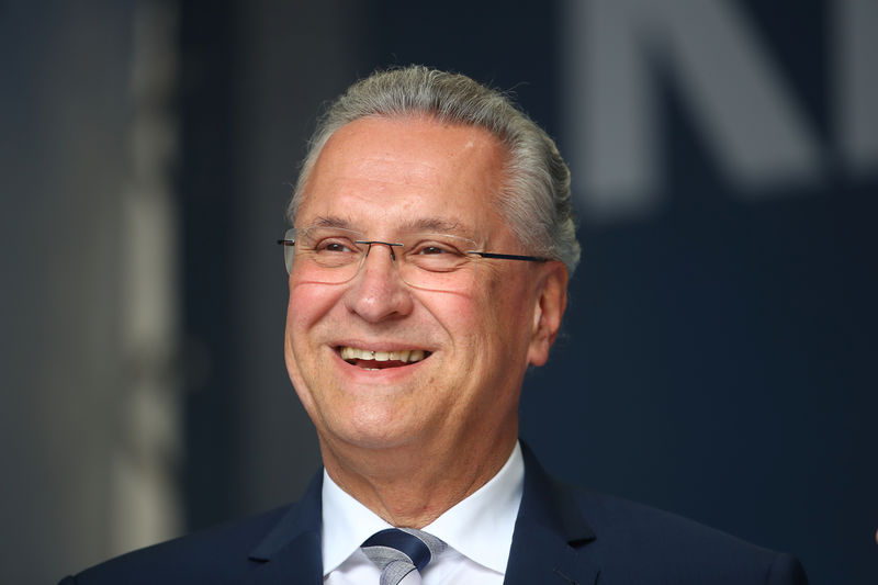 © Reuters. Bavarian Interior Minister Joachim Herrmann during an election rally in Regensburg