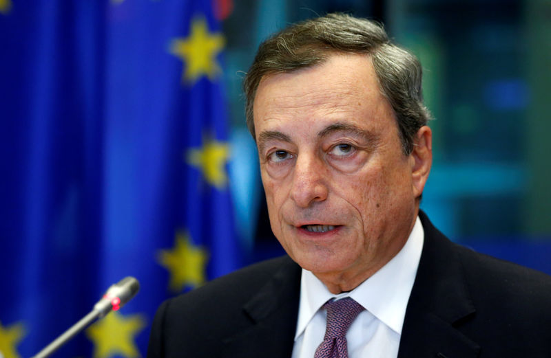 © Reuters. ECB President Draghi addresses the EU Parliament's Economic and Monetary Affairs Committee in Brussels