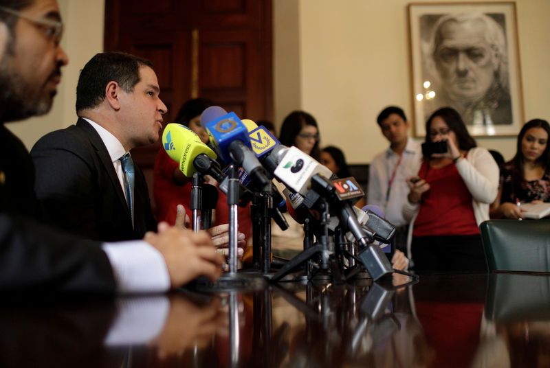 © Reuters. Luis Florido, lawmaker of the Venezuelan coalition of opposition parties (MUD) attends a news conference at the National Assembly building in Caracas