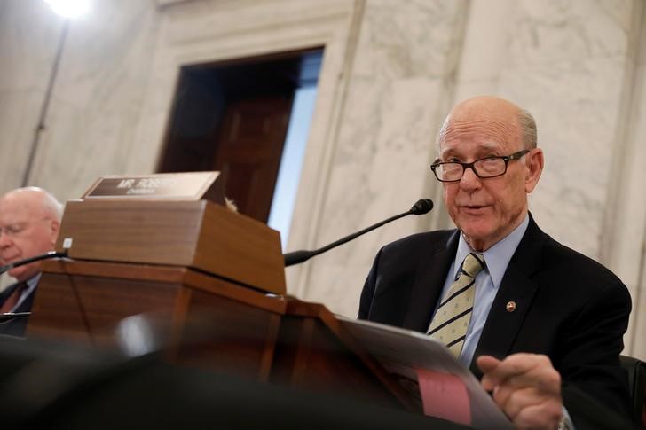 © Reuters. FILE PHOTO - Chairmen Sen. Pat Roberts (R-KS) speaks before Secretary of Agriculture nominee Sonny Perdue's testimony at his confirmation hearing before the Senate Agriculture Committee on Capitol Hill