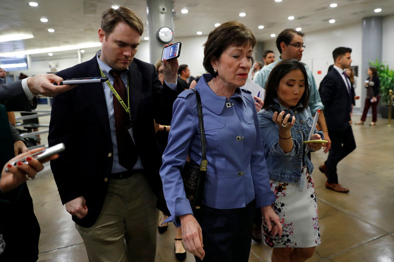 © Reuters. Sen. Susan Collins (R-ME) speaks with reporters ahead of the party luncheons on Capitol Hill in Washington