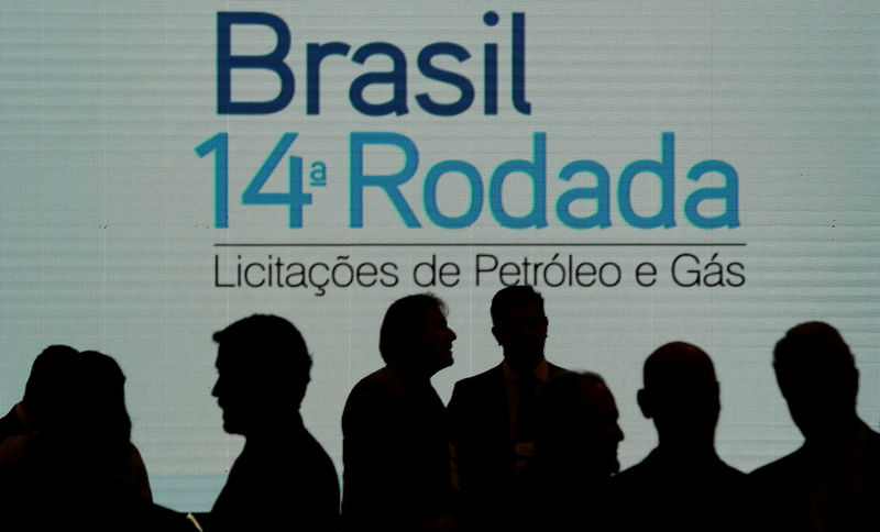© Reuters. Representantes de companhias participam da 14ª Rodada de Licitação de blocos exploratórios de petróleo e gás no Rio de Janeiro, Brasil
