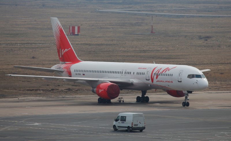 © Reuters. Vim Airlines plane is parked at Domodedovo Airport outside Moscow