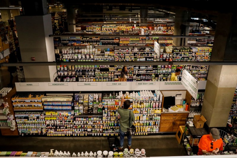 © Reuters. Customers shop at a Whole Foods store in New York