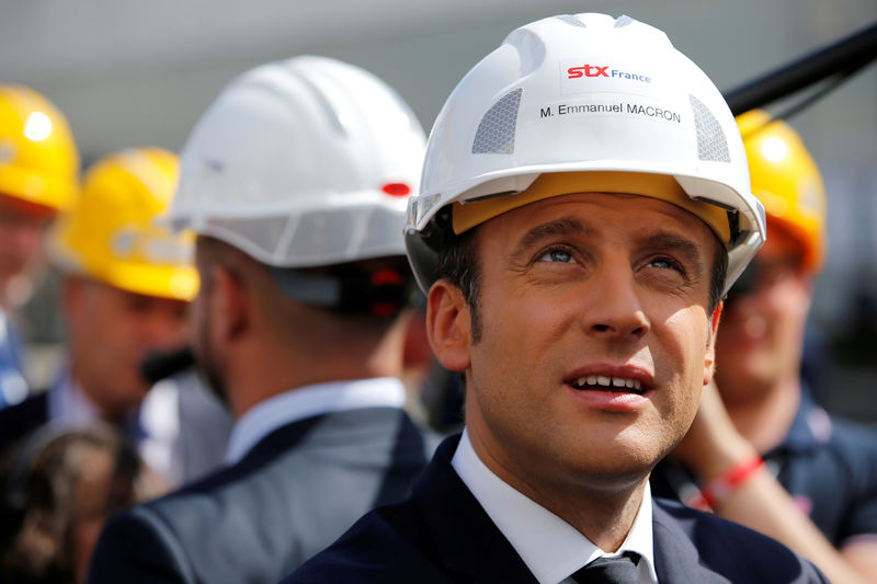 © Reuters. FILE PHOTO French President Emmanuel Macron, attends a visit on MSC Meraviglia cruise ship at the STX Les Chantiers de l'Atlantique shipyard site in Saint-Nazaire