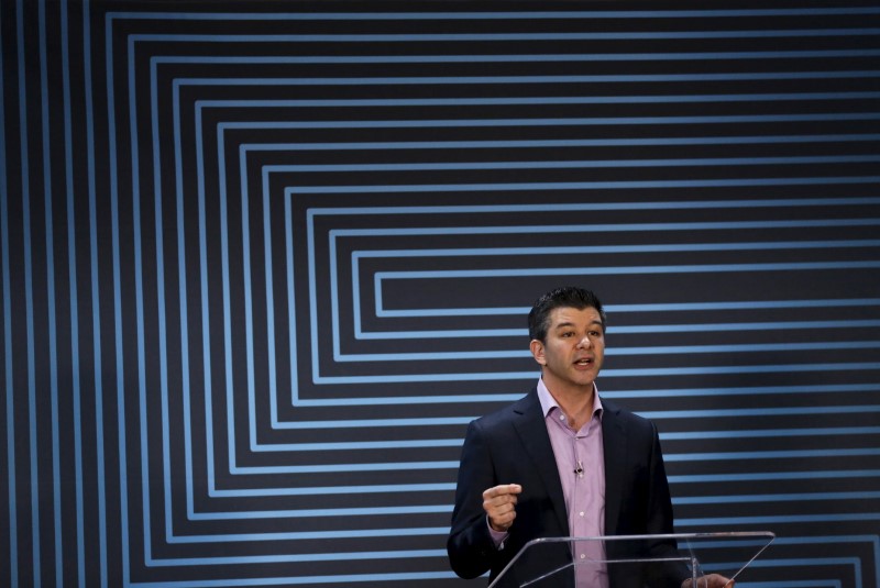 © Reuters. File photo:ber CEO Travis Kalanick  gestures as he delivers an address to employees and drivers marking the company's five year anniversary in San Francisco