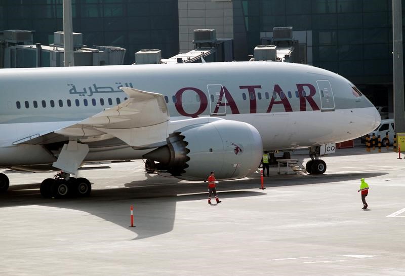 © Reuters. FILE PHOTO: Qatar Airways aircraft is seen at Hamad International Airport in Doha