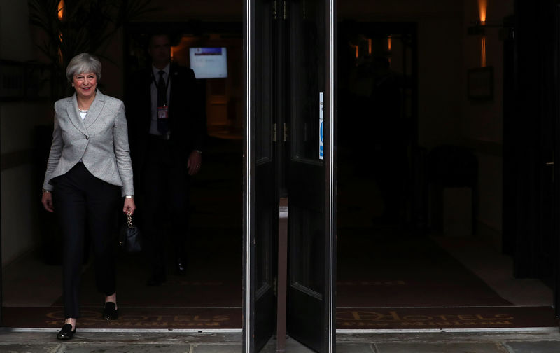 © Reuters. Britain's Prime Minister Theresa May leaves the Midland Hotel on the opening day of the Conservative Party Conference in Manchester