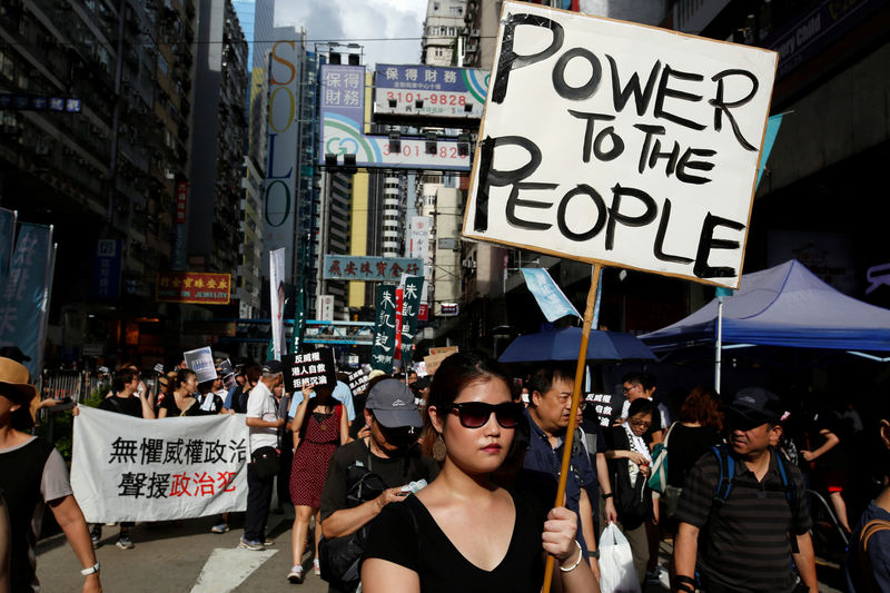 © Reuters. Pro-democracy activists take part in a protest on China's National Day in Hong Kong