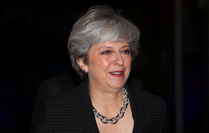 © Reuters. Britain's Prime Minister Theresa May leaves the Midland Hotel on the third day of the Conservative Party Conference in Manchester