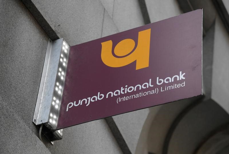 © Reuters. FILE PHOTO: The logo of Punjab National Bank is seen outside of a branch of the bank in the City of London financial district in London