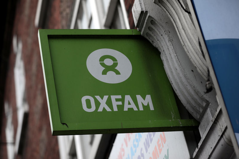 © Reuters. A sign is seen above a branch of Oxfam, in central London