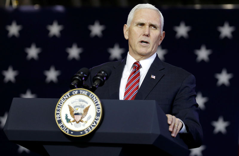 © Reuters. U.S. Vice President Pence addresses members of U.S. military services and JSDF before he departs for South Korea, at U.S. Air Force Yokota base in Fussa