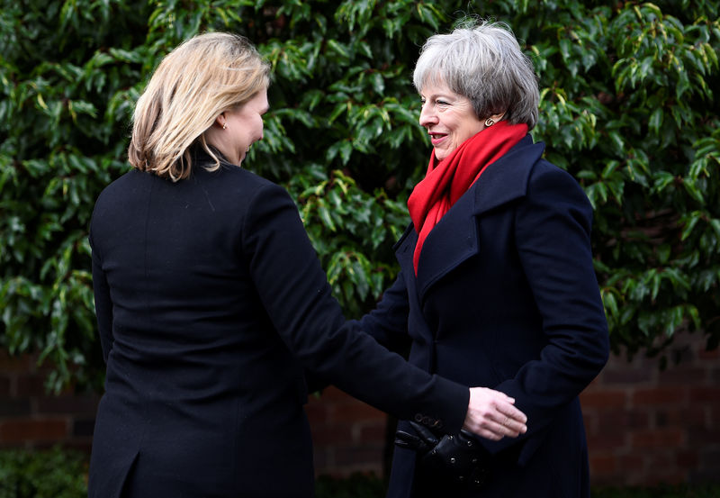 © Reuters. Britain's Prime Minister, Theresa May, greets Northern Ireland Secretary Karen Bradley at Stormont House, in Belfast