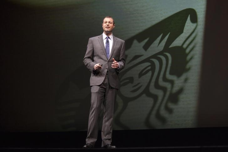 © Reuters. Adam Brotman, is pictured on stage during the company's annual shareholders meeting in Seattle