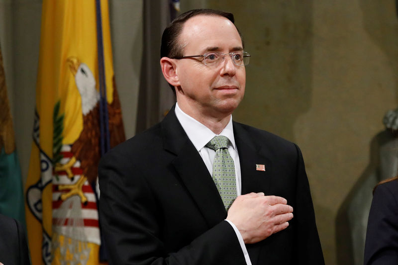 © Reuters. U.S. Deputy Attorney General Rod Rosenstein stands for the pledge of allegiance at a summit about combating human trafficking at the Department of Justice in Washington