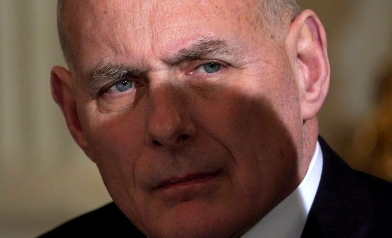 © Reuters. Kelly listens as Trump holds an infrastructure meeting at the White House in Washington