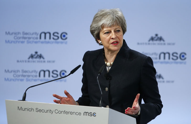 © Reuters. Britain's Prime Minister May talks at the Munich Security Conference in Munich