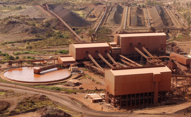 © Reuters. Picture shows part of the processing and stockpile area at a Rio Tinto iron ore mine at Tom Price