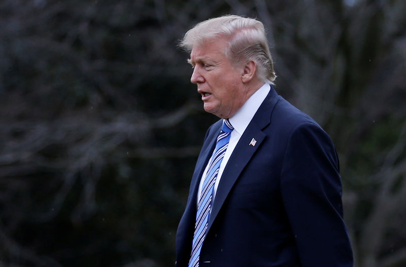 © Reuters. U.S. President Donald Trump walks to Marine One departing for travel to Florida from the South Lawn of the White House in Washington