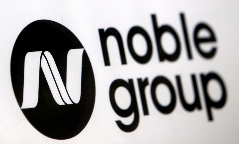 © Reuters. FILE PHOTO: A Noble Group sign is pictured at a meet-the-investors event in Singapore