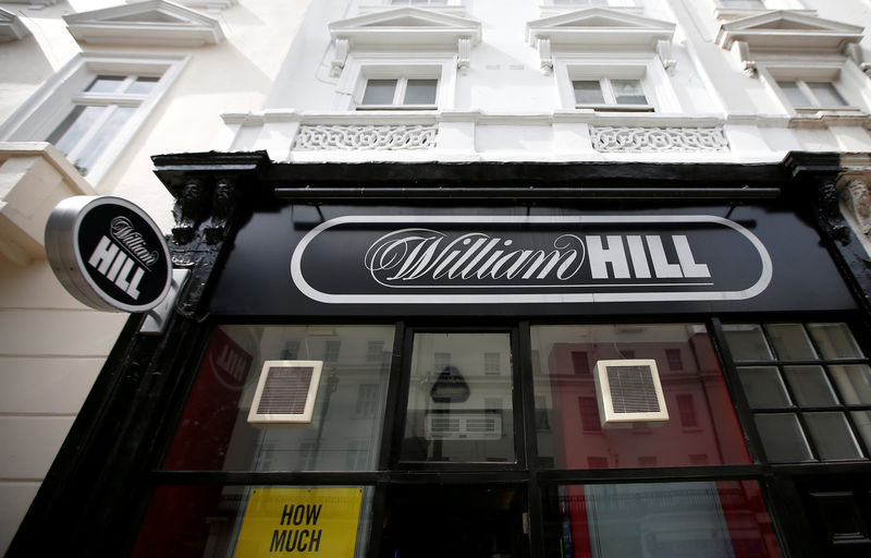 © Reuters. FILE PHOTO: A William Hill bookmaker store is seen in London