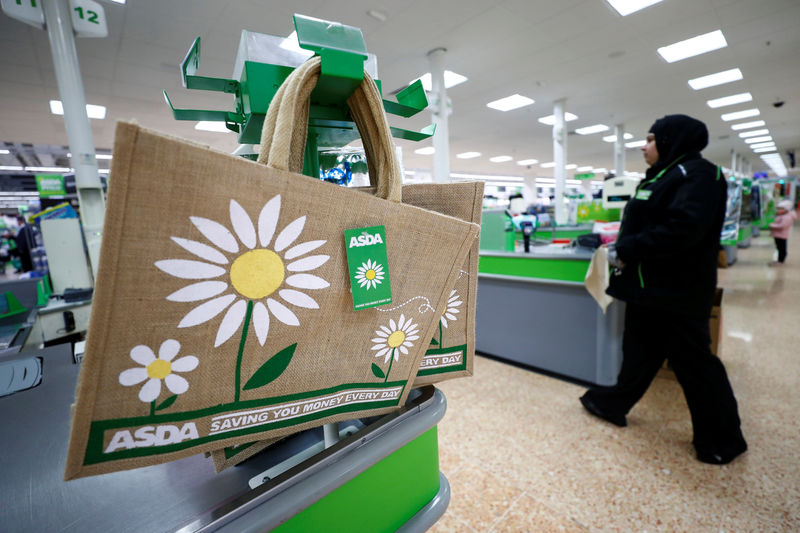 © Reuters. FILE PHOTO:Shopping bags are displayed at the Asda superstore in High Wycombe