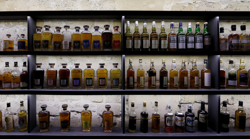 © Reuters. Whisky bottles are displayed inside the Golden Promise whisky bar in Paris