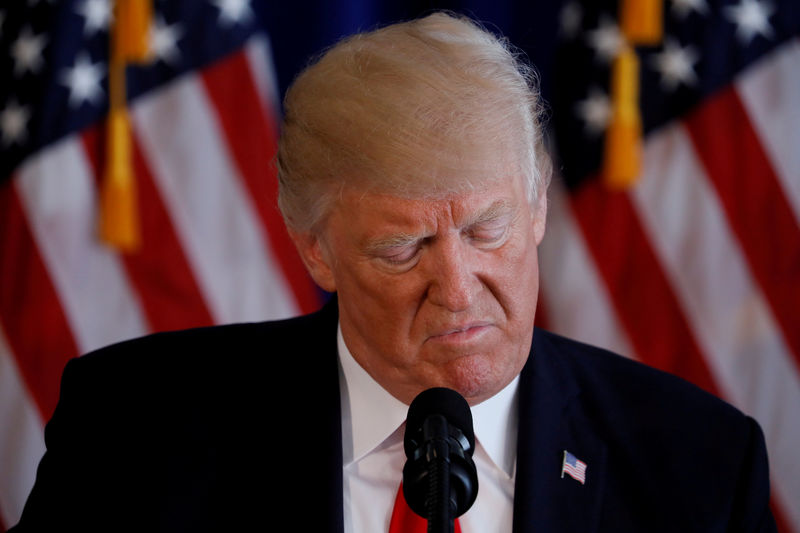 © Reuters. FILE PHOTO: U.S. President Donald Trump delivers remarks on the protests in Charlottesville Virginia from his golf estate in Bedminster New Jersey