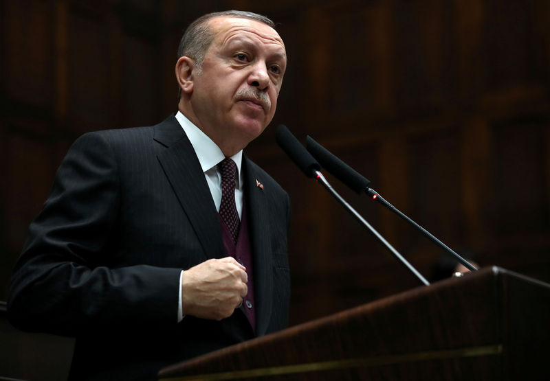 © Reuters. FILE PHOTO: Turkish President Tayyip Erdogan addresses members of parliament in Ankara