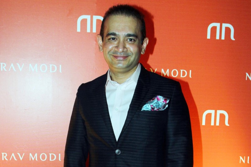 © Reuters. Indian jeweller Nirav Modi poses during the launch of his store in Mumbai
